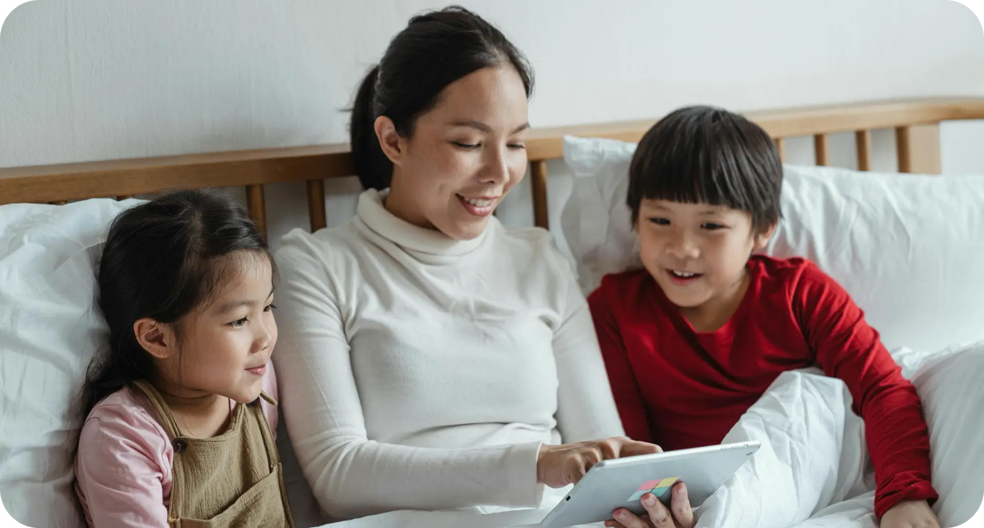 Child coloring a magical unicorn drawing with colorful crayons